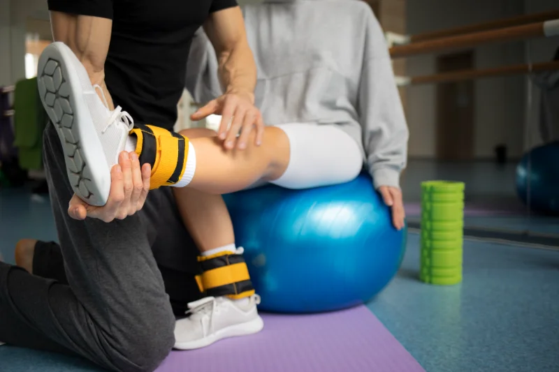 Physical therapy treatment and rehabilitative exercises for joint function and pain relief.