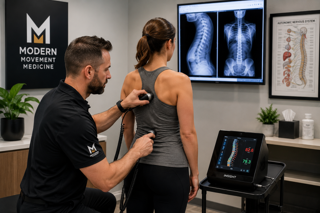 Chiropractor performing a Gonstead spinal examination using advanced diagnostic techniques before creating a personalized treatment plan in Wilsonville, Oregon.